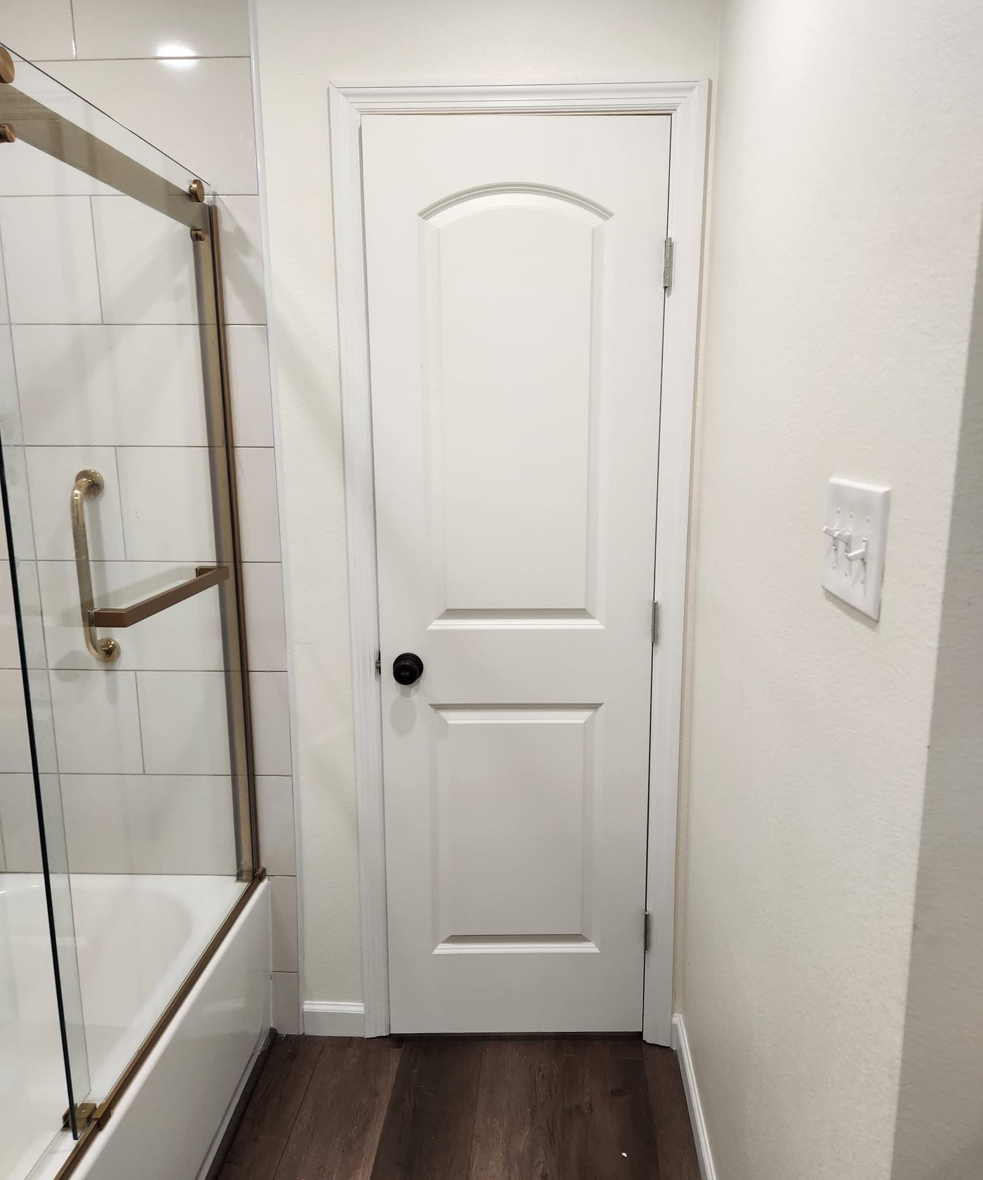 Bathroom with gold hardware & glass